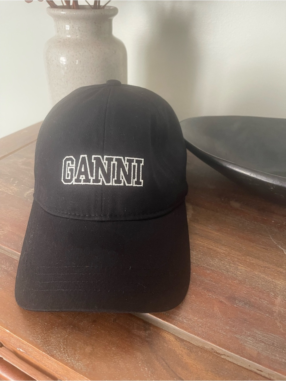 Ganni Black Cap with White Label